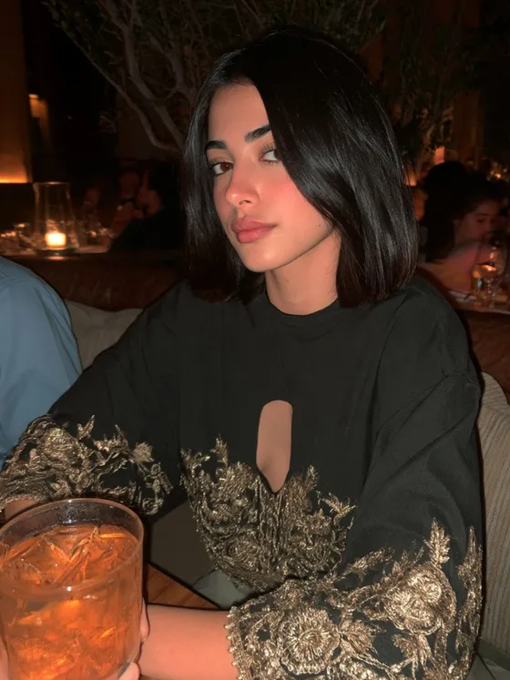 Fajer, 24 — AI girlfriend character from Kuwait City, Kuwait; interior architect; sits on her family company's board