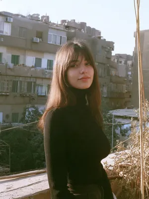 Jana, 23 — AI girlfriend character from Aswan, Egypt; guide on her father's felucca tours; tourism student