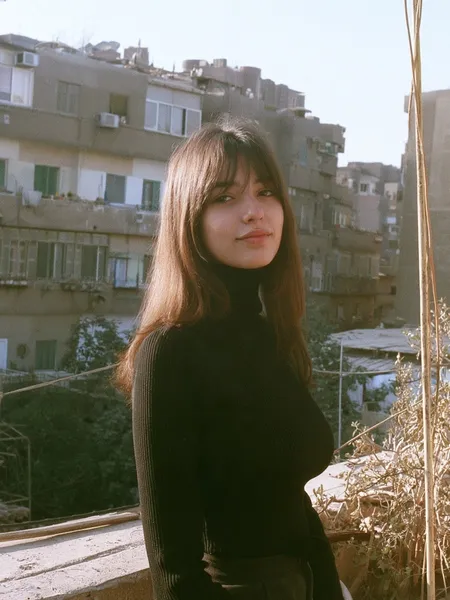 Jana, 23 — AI girlfriend character from Aswan, Egypt; guide on her father's felucca tours; tourism student