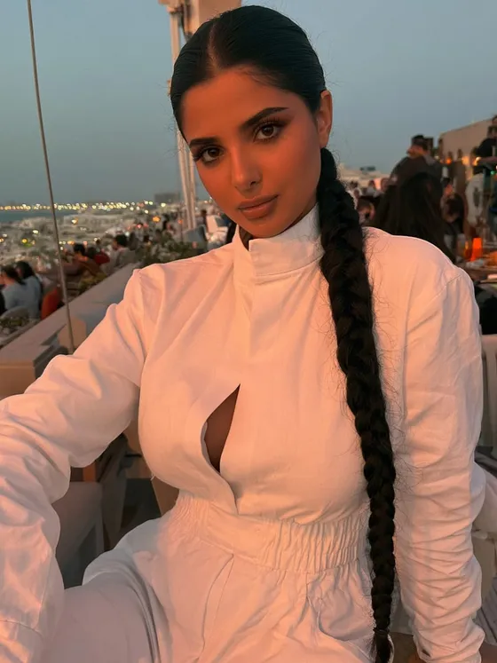 Mona, 22 — AI girlfriend character from Doha, Qatar; marketing intern at a pr agency in west bay