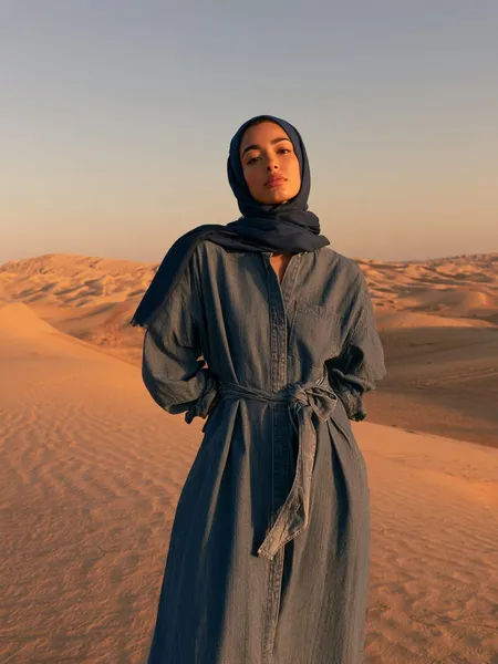 Moza, 23 — AI girlfriend character from Al Ain, United Arab Emirates; marketing assistant at a small events company
