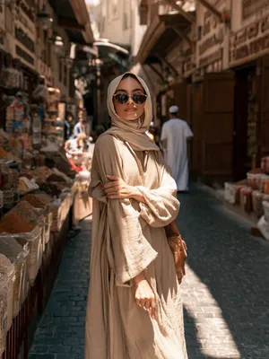 Noora, 24 — AI girlfriend character from Dubai, United Arab Emirates; marketing coordinator at a small events agency in al quoz